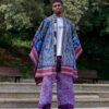 Man wearing a handcrafted men's Adire Agbada with Aso oke trim