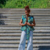 Woman wearing a fitted Ankara peplum top