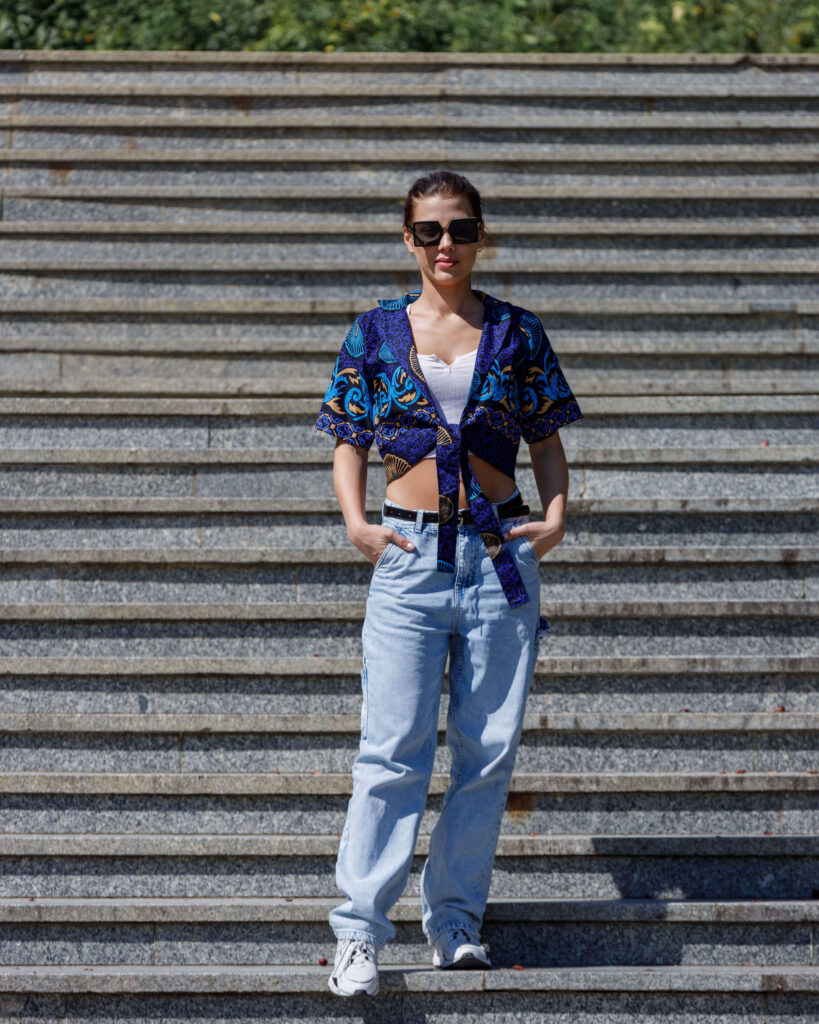 Woman wearing a tie front Ankara crop shirt