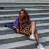 Woman wearing Nigerian Adire Agbada outdoor
