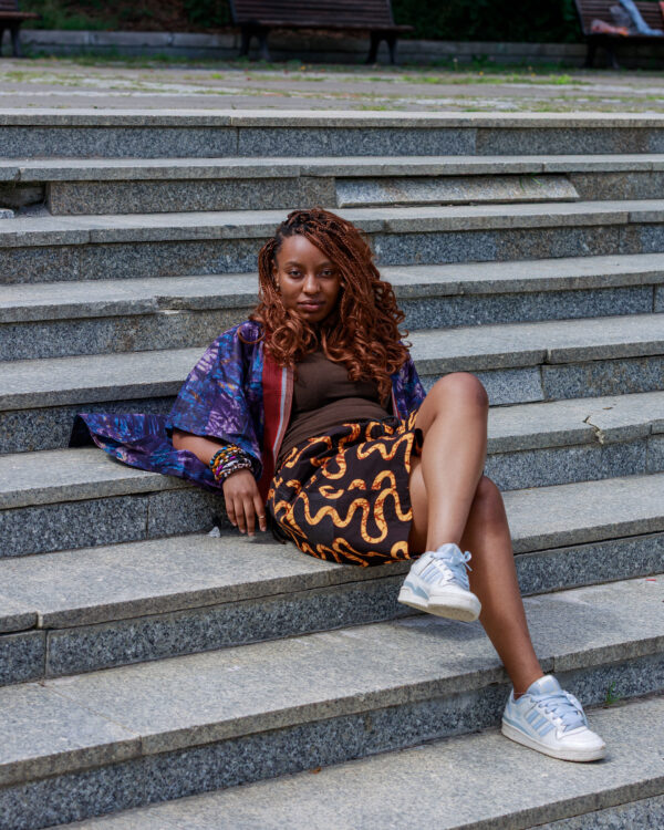Woman wearing Nigerian Adire Agbada outdoor