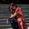 Woman wearing colourful African print bracelets