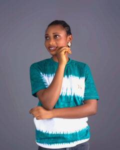 Model wearing BINTA Adire football jersey